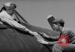 Image of Japanese flag painted on aircraft to record aerial victory Pacific Ocean, 1945, second 16 stock footage video 65675055307