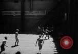 Image of basketball court on aircraft carrier hangar deck Pacific Ocean, 1945, second 3 stock footage video 65675055308