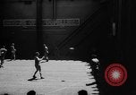 Image of basketball court on aircraft carrier hangar deck Pacific Ocean, 1945, second 6 stock footage video 65675055308