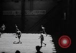 Image of basketball court on aircraft carrier hangar deck Pacific Ocean, 1945, second 7 stock footage video 65675055308
