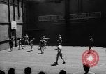Image of basketball court on aircraft carrier hangar deck Pacific Ocean, 1945, second 9 stock footage video 65675055308