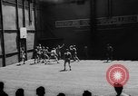 Image of basketball court on aircraft carrier hangar deck Pacific Ocean, 1945, second 14 stock footage video 65675055308