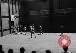Image of basketball court on aircraft carrier hangar deck Pacific Ocean, 1945, second 16 stock footage video 65675055308