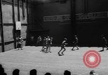 Image of basketball court on aircraft carrier hangar deck Pacific Ocean, 1945, second 18 stock footage video 65675055308
