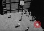 Image of basketball court on aircraft carrier hangar deck Pacific Ocean, 1945, second 22 stock footage video 65675055308