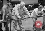 Image of basketball court on aircraft carrier hangar deck Pacific Ocean, 1945, second 46 stock footage video 65675055308