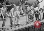 Image of basketball court on aircraft carrier hangar deck Pacific Ocean, 1945, second 52 stock footage video 65675055308