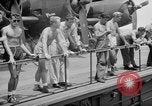 Image of basketball court on aircraft carrier hangar deck Pacific Ocean, 1945, second 53 stock footage video 65675055308