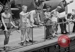 Image of basketball court on aircraft carrier hangar deck Pacific Ocean, 1945, second 55 stock footage video 65675055308