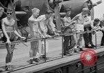 Image of basketball court on aircraft carrier hangar deck Pacific Ocean, 1945, second 57 stock footage video 65675055308