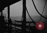 Image of man on the deck Pacific Ocean, 1944, second 9 stock footage video 65675055311