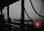 Image of man on the deck Pacific Ocean, 1944, second 12 stock footage video 65675055311
