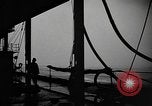Image of man on the deck Pacific Ocean, 1944, second 13 stock footage video 65675055311