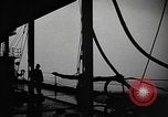 Image of man on the deck Pacific Ocean, 1944, second 14 stock footage video 65675055311