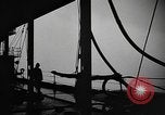 Image of man on the deck Pacific Ocean, 1944, second 17 stock footage video 65675055311