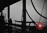 Image of man on the deck Pacific Ocean, 1944, second 18 stock footage video 65675055311