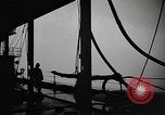 Image of man on the deck Pacific Ocean, 1944, second 19 stock footage video 65675055311