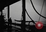 Image of man on the deck Pacific Ocean, 1944, second 20 stock footage video 65675055311