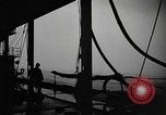 Image of man on the deck Pacific Ocean, 1944, second 21 stock footage video 65675055311
