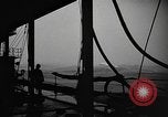 Image of man on the deck Pacific Ocean, 1944, second 22 stock footage video 65675055311