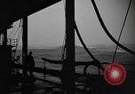 Image of man on the deck Pacific Ocean, 1944, second 23 stock footage video 65675055311