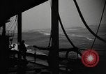 Image of man on the deck Pacific Ocean, 1944, second 25 stock footage video 65675055311