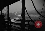 Image of man on the deck Pacific Ocean, 1944, second 26 stock footage video 65675055311
