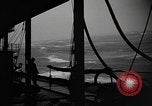 Image of man on the deck Pacific Ocean, 1944, second 27 stock footage video 65675055311