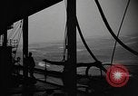Image of man on the deck Pacific Ocean, 1944, second 29 stock footage video 65675055311