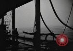 Image of man on the deck Pacific Ocean, 1944, second 31 stock footage video 65675055311
