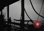 Image of man on the deck Pacific Ocean, 1944, second 33 stock footage video 65675055311