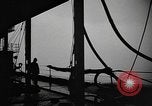 Image of man on the deck Pacific Ocean, 1944, second 34 stock footage video 65675055311