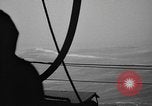Image of man on the deck Pacific Ocean, 1944, second 46 stock footage video 65675055311