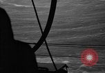 Image of man on the deck Pacific Ocean, 1944, second 58 stock footage video 65675055311