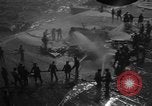 Image of burning TBF Avenger Pacific Ocean, 1945, second 10 stock footage video 65675055312