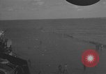 Image of burning TBF Avenger Pacific Ocean, 1945, second 19 stock footage video 65675055312