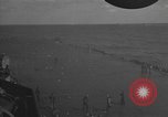 Image of burning TBF Avenger Pacific Ocean, 1945, second 20 stock footage video 65675055312