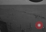 Image of burning TBF Avenger Pacific Ocean, 1945, second 21 stock footage video 65675055312