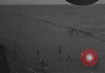 Image of burning TBF Avenger Pacific Ocean, 1945, second 22 stock footage video 65675055312