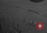 Image of burning TBF Avenger Pacific Ocean, 1945, second 23 stock footage video 65675055312