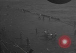 Image of burning TBF Avenger Pacific Ocean, 1945, second 24 stock footage video 65675055312