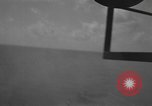 Image of burning TBF Avenger Pacific Ocean, 1945, second 26 stock footage video 65675055312