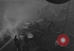 Image of burning TBF Avenger Pacific Ocean, 1945, second 32 stock footage video 65675055312