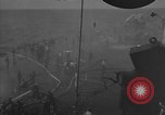 Image of burning TBF Avenger Pacific Ocean, 1945, second 36 stock footage video 65675055312