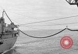 Image USS Mattaponi AO-41 huileur refueling CVA-19 du golfe du Tonkin, 1965, de la seconde 58 séquences d'archives historiques vidéo 65675055331