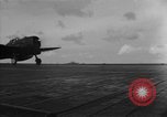 Image of F6F hellcats take off from the USS Hancock Pacific Ocean, 1944, second 7 stock footage video 65675055348