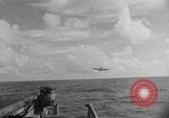 Image of F6F hellcats take off from the USS Hancock Pacific Ocean, 1944, second 13 stock footage video 65675055348