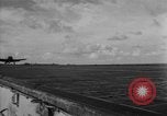 Image of F6F hellcats take off from the USS Hancock Pacific Ocean, 1944, second 14 stock footage video 65675055348