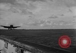 Image of F6F hellcats take off from the USS Hancock Pacific Ocean, 1944, second 15 stock footage video 65675055348