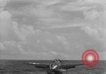 Image of F6F hellcats take off from the USS Hancock Pacific Ocean, 1944, second 24 stock footage video 65675055348